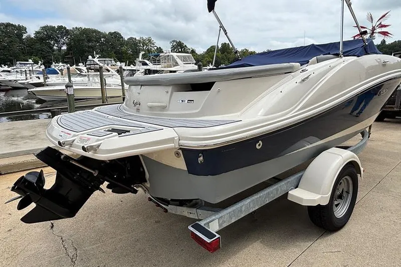 Slide: The Image of 2008 Sea Ray 185 Sport boat on trailer at marina, rear view. - 5