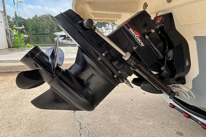 Slide: The Image of 2008 Sea Ray 185 Sport boat with MerCruiser outdrive, docked near marina. - 6