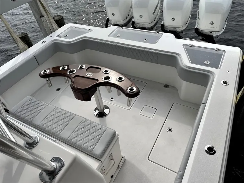 Slide: The Image of 2020 Front Runner 39 Center Console boat with spacious deck and multiple outboard engines. - 36