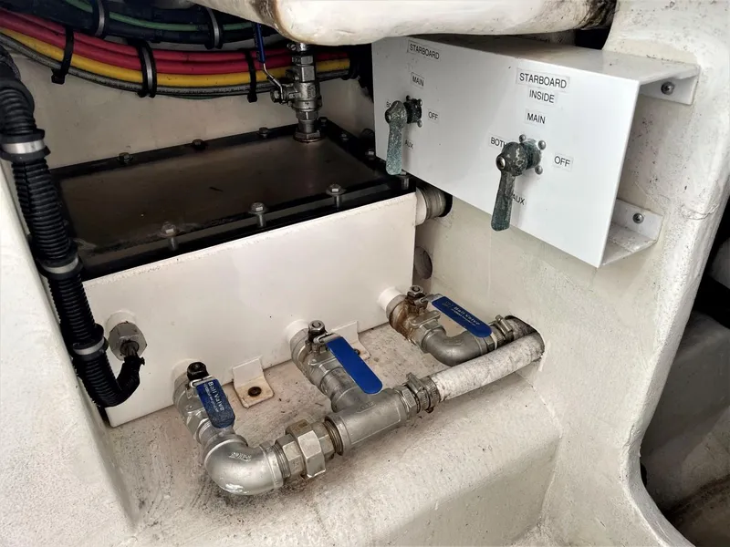 Slide: The Image of 2020 Front Runner 39 Center Console boat plumbing and wiring system close-up. - 42