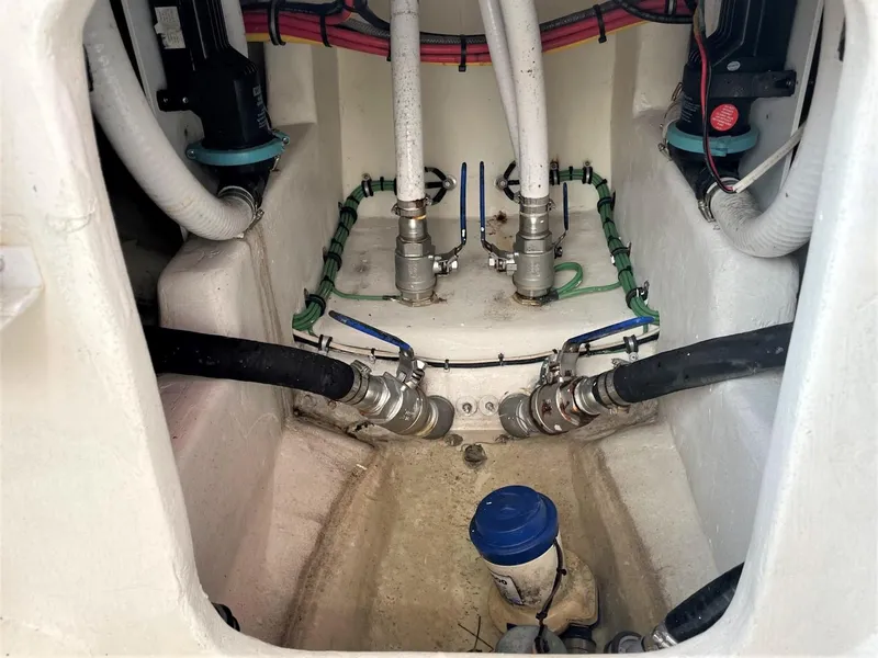 Slide: The Image of Bilge area of 2020 Front Runner 39 Center Console with hoses and fittings. - 43