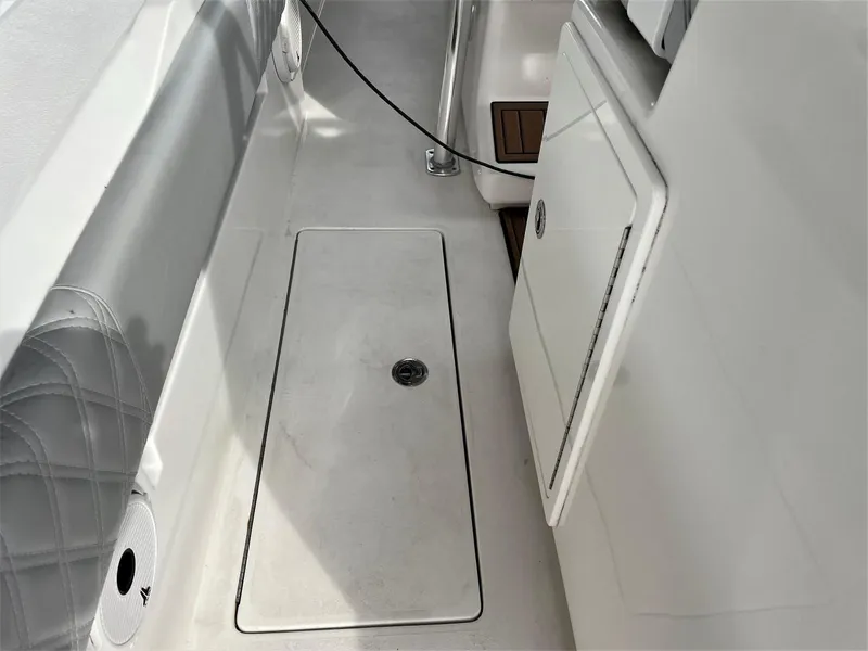 Slide: The Image of 2020 Front Runner 39 Center Console boat interior with storage compartment. - 48