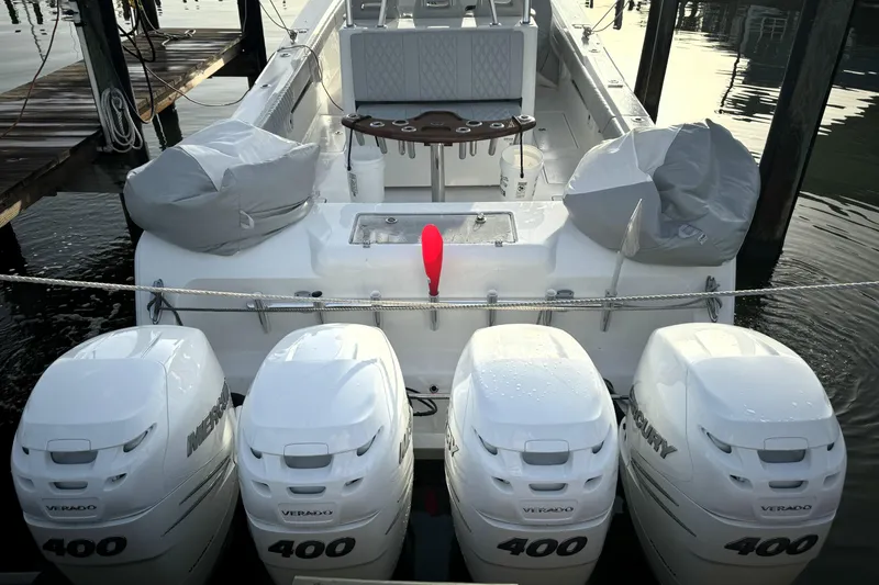 Slide: The Image of 2020 Front Runner 39 Center Console boat with four Mercury Verado 400 engines docked. - 7