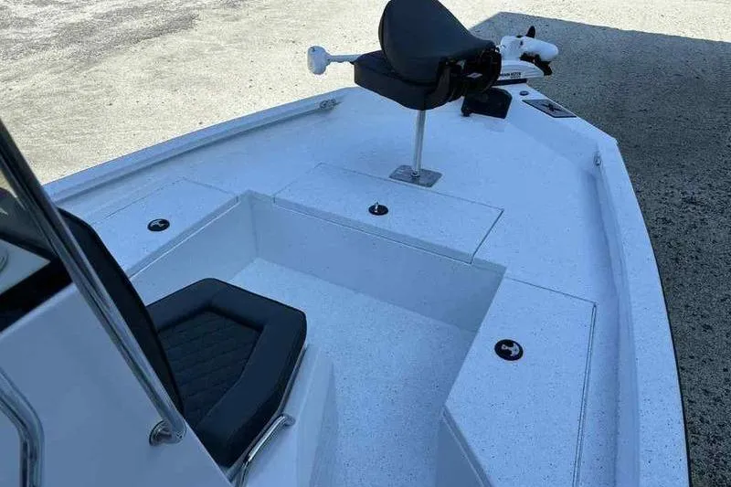 Slide: The Image of 2026 Xpress H20B boat interior with seating and storage compartments. - 9