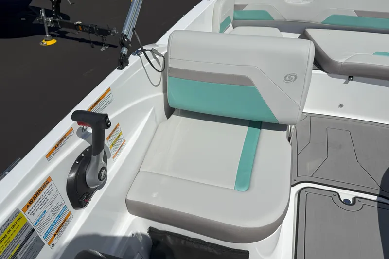 Slide: The Image of 2026 Hurricane SunDeck Sport 185 OB boat interior with teal and gray seating. - 10