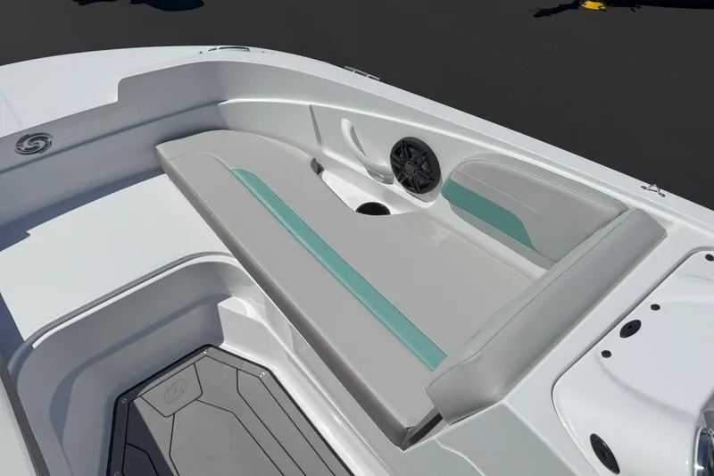 Slide: The Image of 2026 Hurricane SunDeck Sport 185 OB boat interior with cushioned seating and speaker. - 12