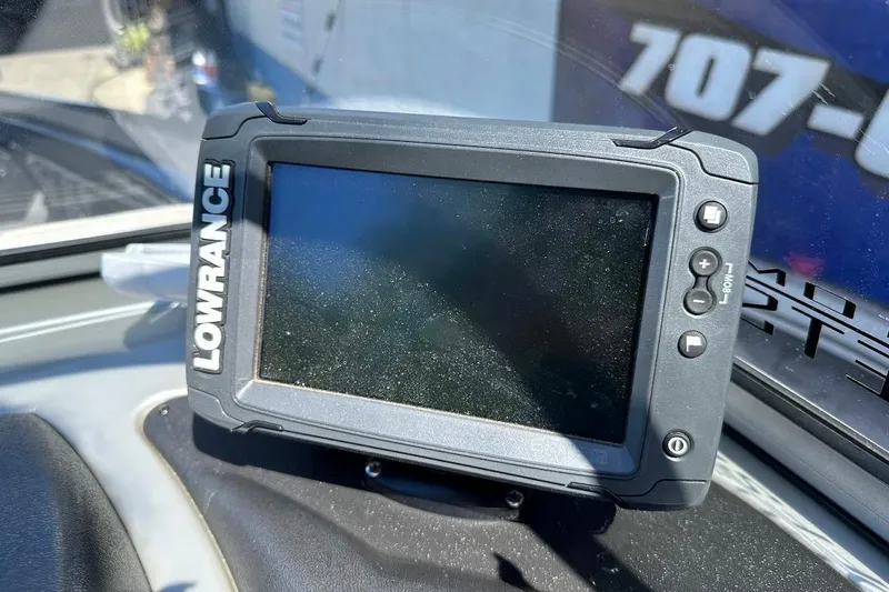 Slide: The Image of Lowrance fish finder on 2018 Tracker Targa V-19 Combo boat dashboard. - 18