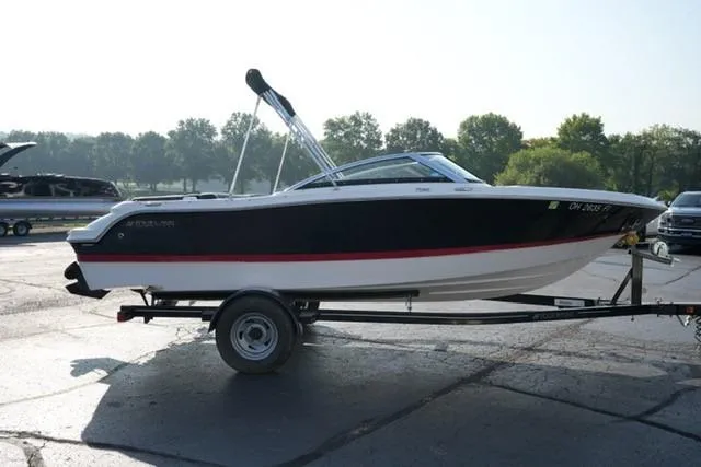 Slide: The Image of 2013 Four Winns H190 boat on trailer, parked outdoors. - 3