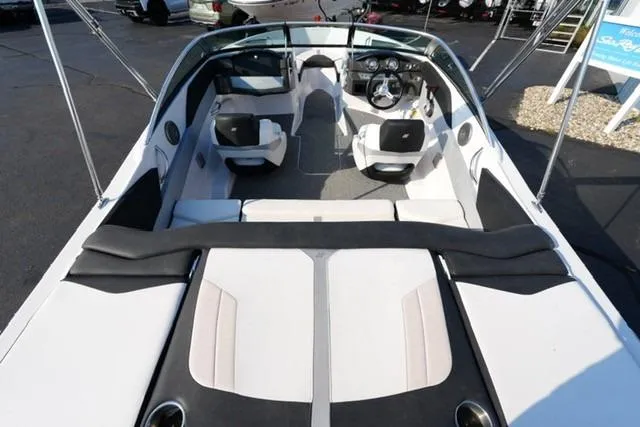 Slide: The Image of 2013 Four Winns H190 boat interior with seating and steering wheel. - 7