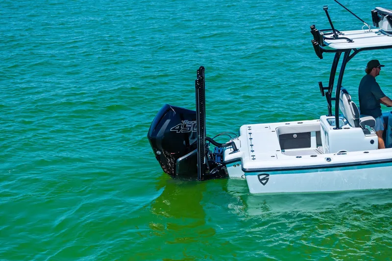 Slide: The Image of 2020 Barker Boatworks 26 Open on water, featuring powerful outboard engine. - 9