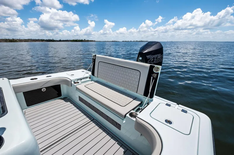 Slide: The Image of 2020 Barker Boatworks 26 Open on water, featuring spacious deck and powerful engine. - 22