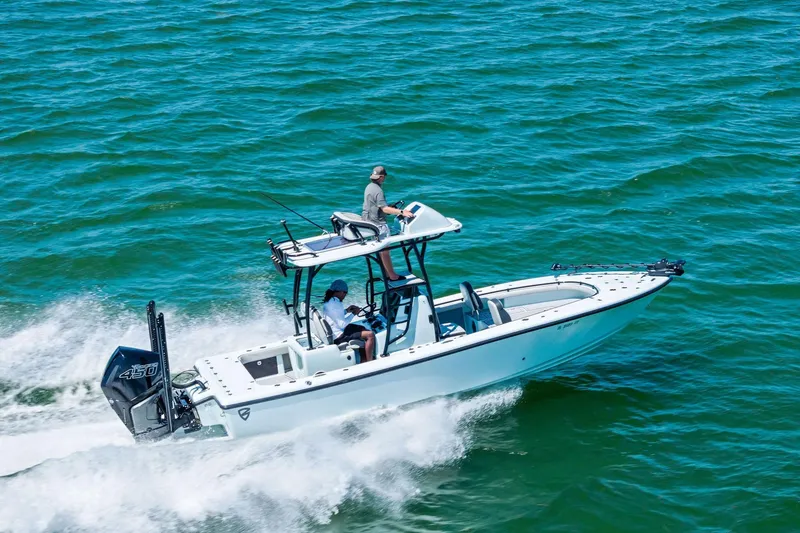 Slide: The Image of 2020 Barker Boatworks 26 Open cruising on open water, showcasing sleek design and performance. - 25