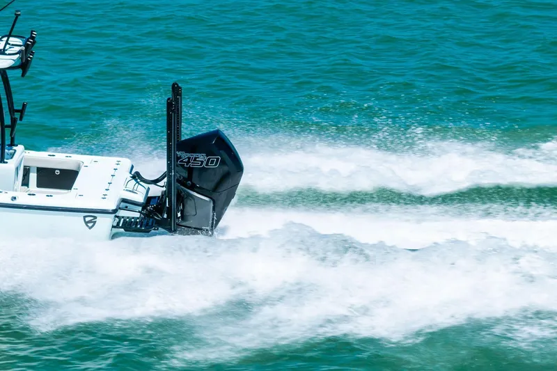 Slide: The Image of 2020 Barker Boatworks 26 Open speeding on water with powerful outboard engine. - 31