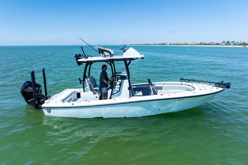 Slide: The Image of 2020 Barker Boatworks 26 Open cruising on clear blue water. - 5
