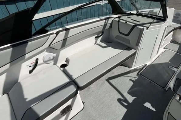 Slide: The Image of 2026 Yamaha Boats AR220 interior with sleek seating and modern design. - 10
