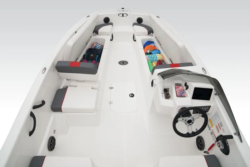 Slide: The Image of 2024 Tahoe T18 boat interior with seating, storage, and modern dashboard features. - 9