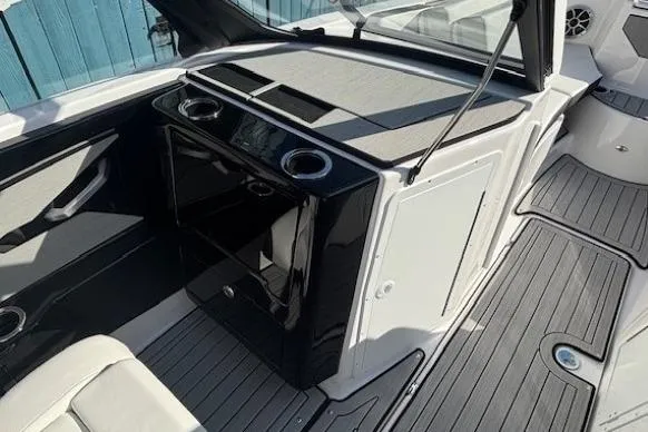 Slide: The Image of 2026 Yamaha Boats 222S interior with sleek design and modern amenities. - 15