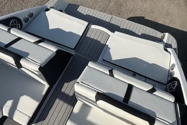 Slide: The Image of 2026 Yamaha Boats 222S interior with sleek seating and modern design. - 19