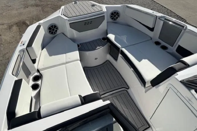 Slide: The Image of 2026 Yamaha Boats 222S interior with spacious seating and modern design. - 6