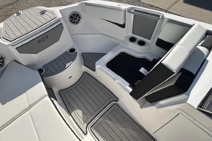 Slide: The Image of 2026 Yamaha Boats 222S interior, featuring sleek seating and modern design elements. - 7
