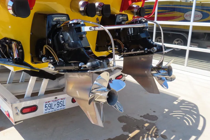 Slide: The Image of 2003 Cigarette 38 Top Gun boat with dual Mercury Racing engines and propellers. - 9