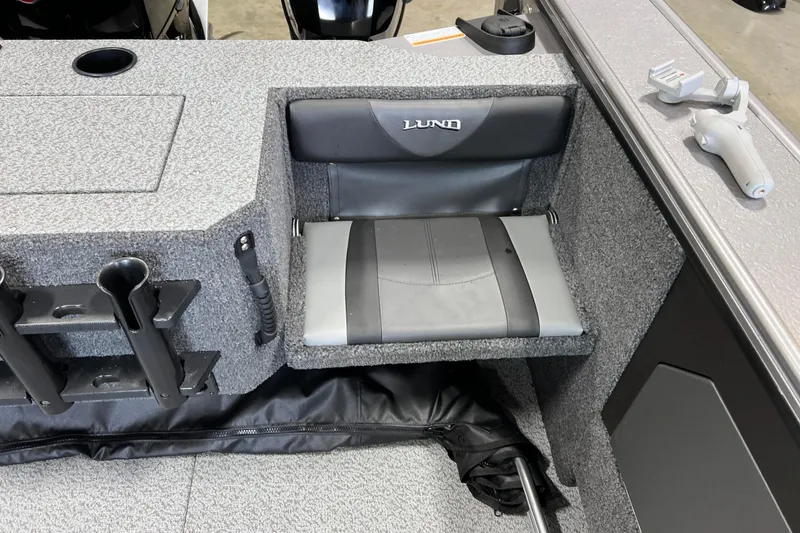 Slide: The Image of 2026 Lund 1875 Fisherman boat seat with rod holders and accessories. - 16