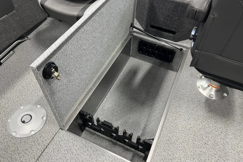 Slide: The Image of 2026 Lund 1875 Fisherman boat interior with storage compartment and seating. - 19