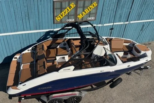 Slide: The Image of 2026 Yamaha Boats 222SE in blue, displayed at Sizzle Marine, Ohio. - 6