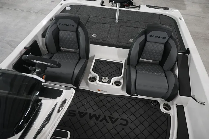 Slide: The Image of 2026 Caymas CX19 PRO boat interior with dual seats and steering wheel. - 10