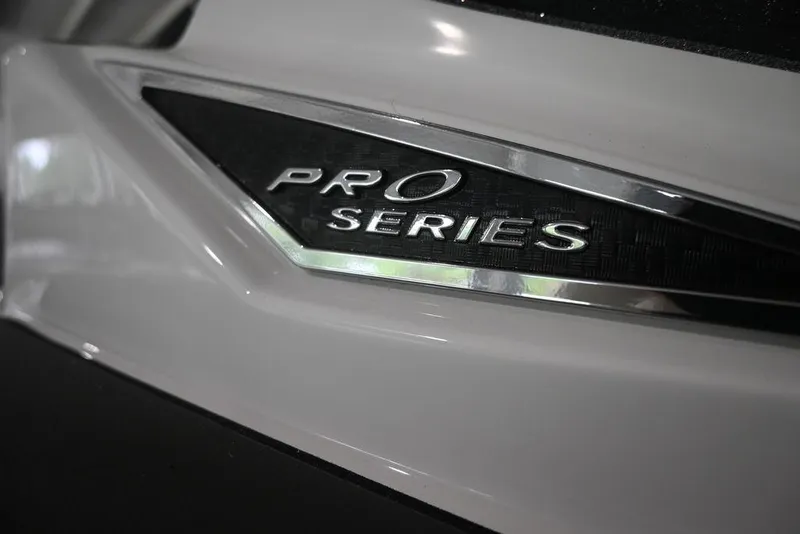 Slide: The Image of 2026 Caymas CX19 PRO Series emblem on sleek boat exterior. - 8