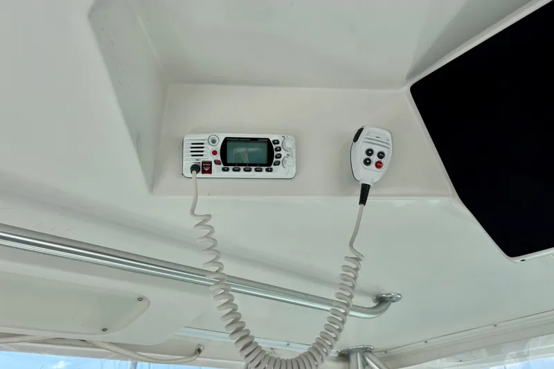 Slide: The Image of VHF radio system on 2002 Luhrs 32 Open boat ceiling. - 27