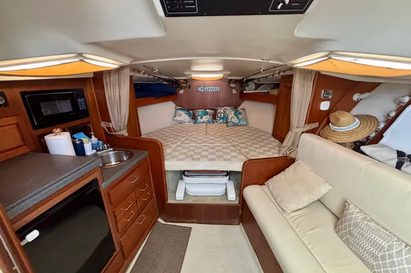 Slide: The Image of Interior of 2002 Luhrs 32 Open boat with cozy cabin and kitchenette. - 40