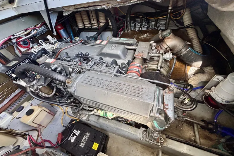 Slide: The Image of Engine compartment of a 2002 Luhrs 32 Open boat with Yanmar engine. - 49