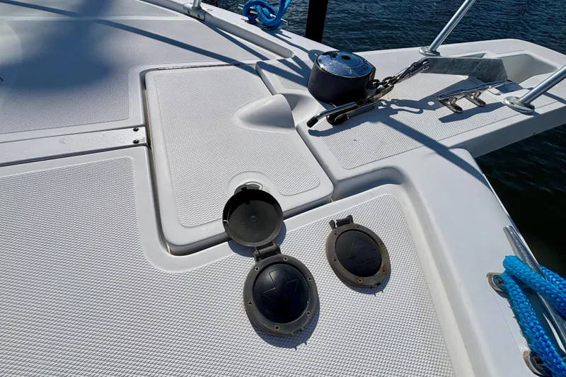 Slide: The Image of Deck of 2002 Luhrs 32 Open boat with anchor and rope details. - 7