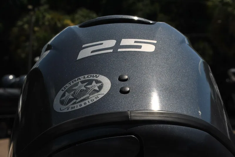 Slide: The Image of Custom Underwood 2014 engine with "25" marking and ultra-low emission sticker. - 13