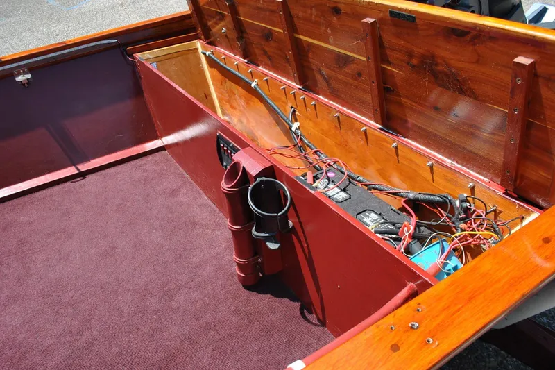 Slide: The Image of Interior of a 2014 Custom Underwood boat showing wiring and battery setup. - 18