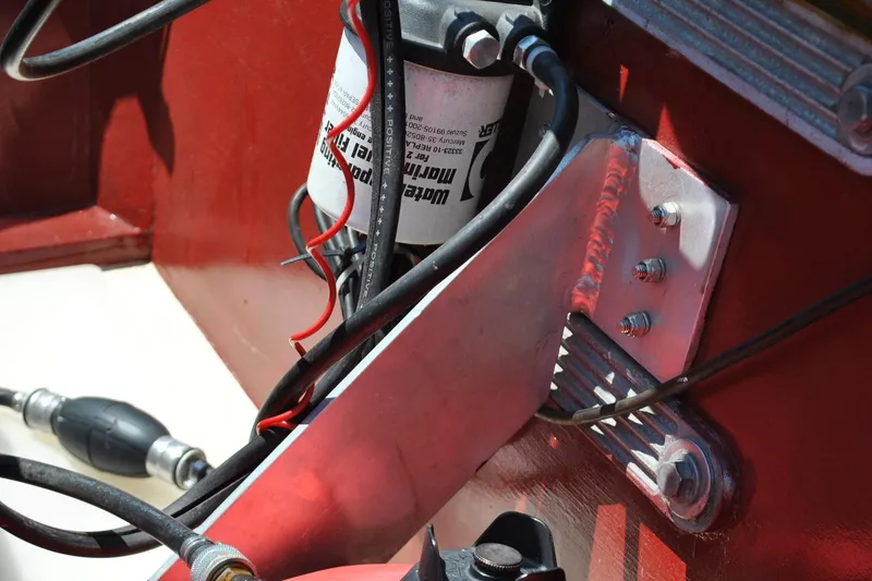 Slide: The Image of Close-up of a 2014 Custom Underwood engine component with wiring and metal bracket. - 21