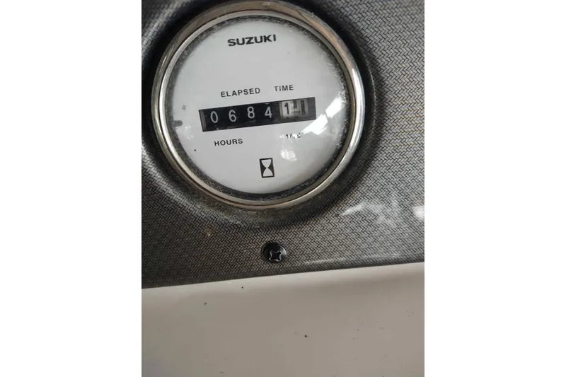 Slide: The Image of Suzuki hour meter showing 684 hours on 2007 PlayCraft 22 Clipper boat. - 5