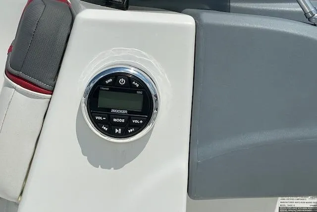 Slide: The Image of Dashboard of 2022 Tahoe T6 featuring a Kicker audio control panel. - 9