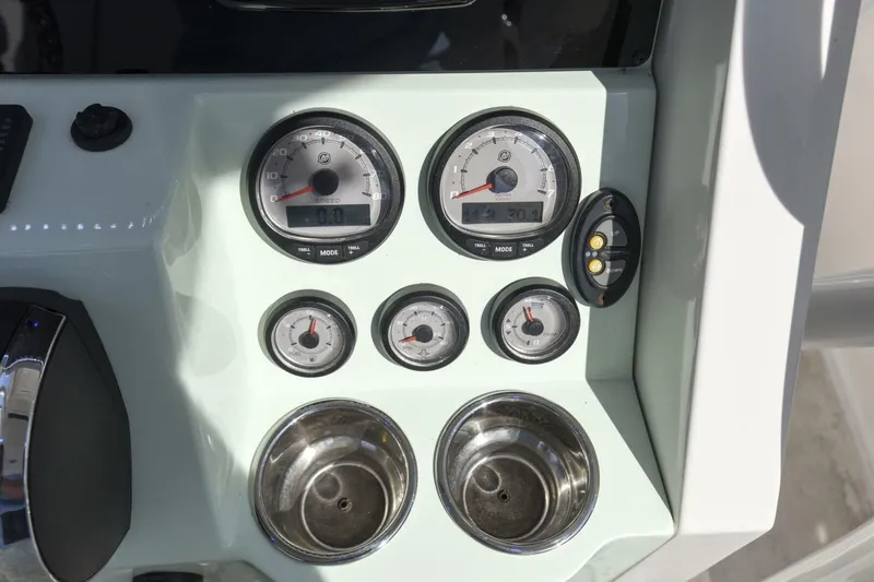 Slide: The Image of Dashboard of 2022 Ranger 2360 Bay boat with gauges and controls. - 28