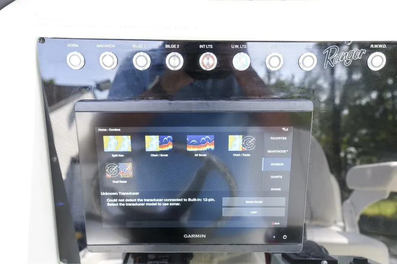 Slide: The Image of Control panel of a 2022 Ranger 2360 Bay boat with Garmin display. - 30