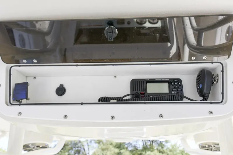 Slide: The Image of 2022 Ranger 2360 Bay boat console with radio and speaker system. - 35