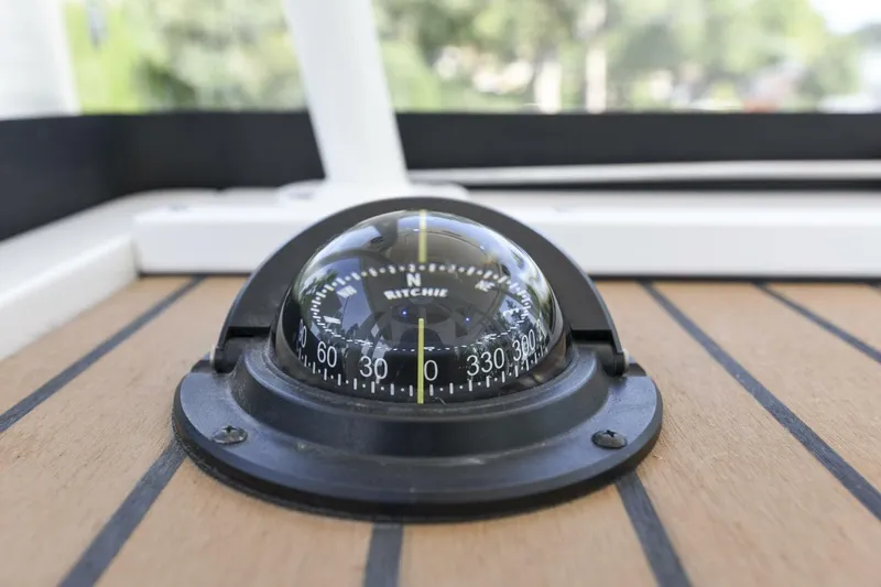 Slide: The Image of Compass on 2022 Ranger 2360 Bay boat deck, close-up view. - 36