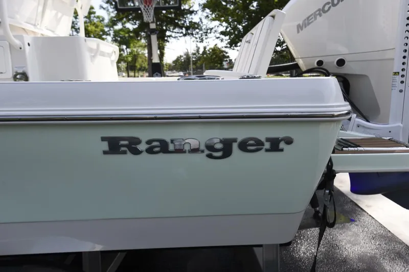 Slide: The Image of 2022 Ranger 2360 Bay boat with Mercury engine, side view. - 37