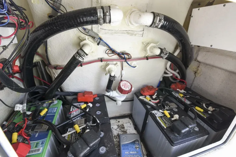 Slide: The Image of Electrical system and batteries inside a 2022 Ranger 2360 Bay boat. - 43