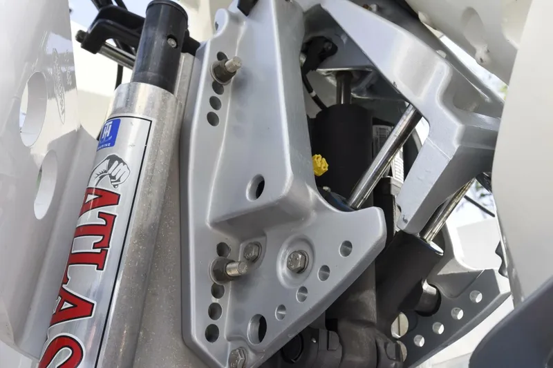 Slide: The Image of Close-up of 2022 Ranger 2360 Bay boat's Atlas hydraulic jack plate mechanism. - 44