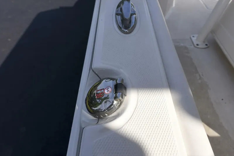 Slide: The Image of 2022 Ranger 2360 Bay boat deck with chrome fittings and textured surface. - 59