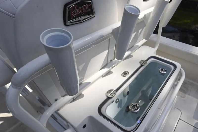 Slide: The Image of 2022 Ranger 2360 Bay boat with rod holders and livewell. - 65