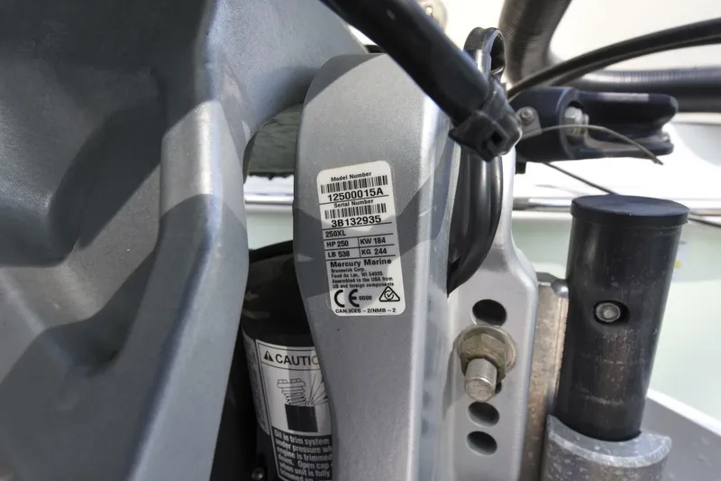 Slide: The Image of 2022 Ranger 2360 Bay boat engine label with specifications and serial number. - 95