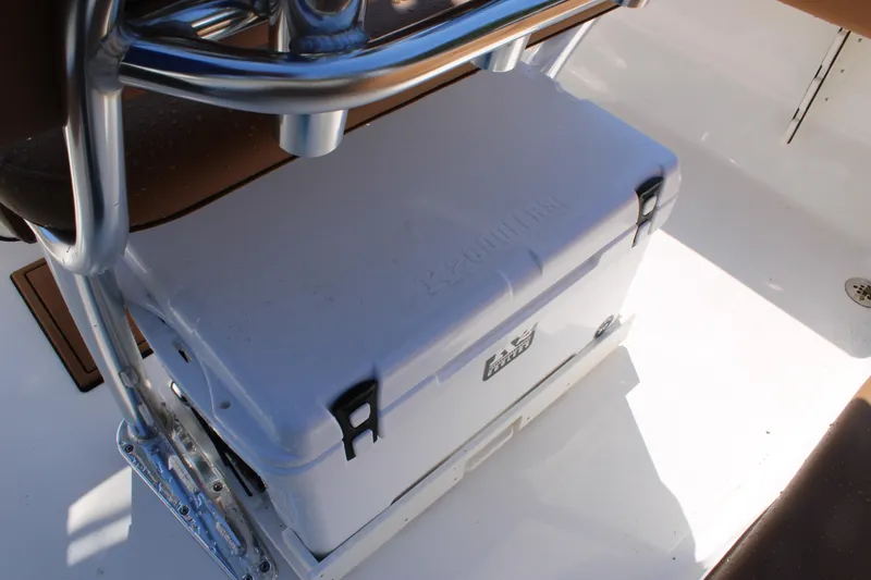 Slide: The Image of 2026 Key West 189 FS boat interior with cooler storage under seat. - 24